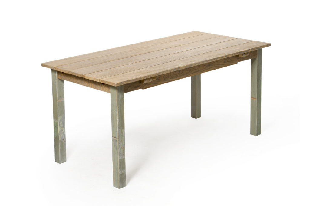 Tavolo in legno massello con prolunghe con apertura